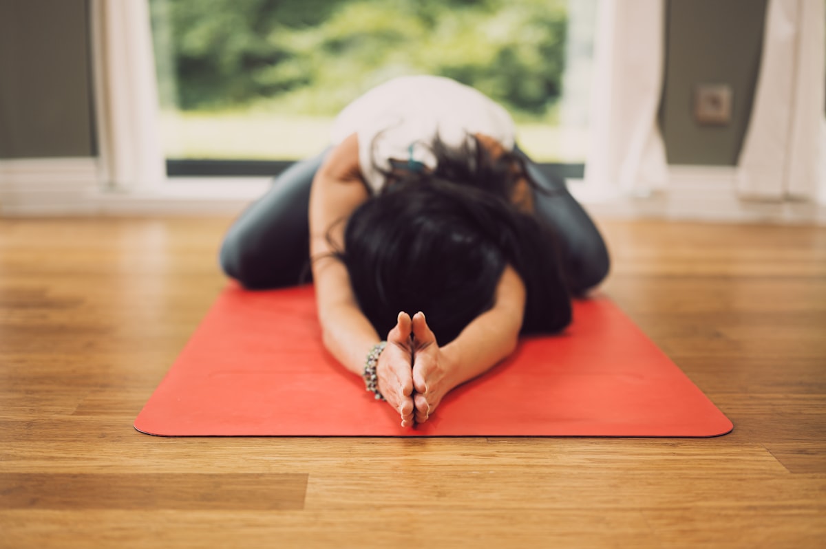 Woman practicing yoga in peaceful setting